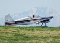 N443MW @ KAPA - Position and hold for 17L with Pikes Peak in the Distance.