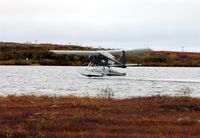 N734Q - Departing north from H-Marker Lake - by Martin Prince, Jr