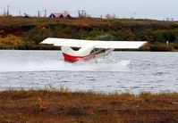 N81818 - Departing north west from H-Marker Lake with vapor off the prop - by Martin Prince, Jr