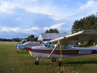 N8506U @ DRM - Parked after a departing thunderstorm - by Richard Mudd