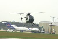 N369AW @ CID - Approaching to land at the Landmark ramp.  Seen from my office window