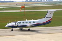 N821DK @ CID - Taxiing to Runway 27 for departure.