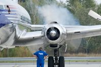 N996DM @ LOWW - Red Bull DC6 - by Andy Graf-VAP