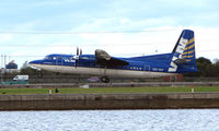 OO-VLY @ EGLC - VLM Fokker 50 in standard scheme at London City - by Terry Fletcher