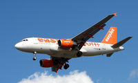 G-EZAC @ EGKK - Easyjet A319 about to land at London Gatwick