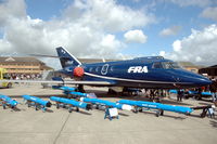 G-FRAR @ EGDY - One of Cobham's Falcon 20Ds surrounded by its tools at RNAS Yeovilton Air Day 2008. - by Henk van Capelle