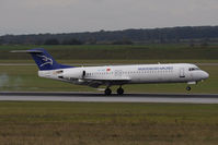 4O-AOT @ VIE - Montenegro Airlines Fokker F-100 - by Juergen Postl