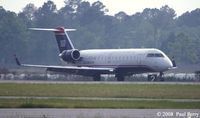 N245PS @ EWN - Another CL-600, this one landing.