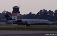 N245PS @ EWN - Taxiing by the tower