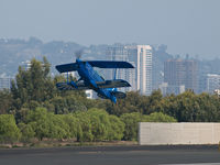 N540BE @ SMO - N540BE in a steep climb after departing on RWY 21 - by Torsten Hoff