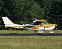 N7667G @ 5W8 - Taxiing runway 4 - by John W. Thomas