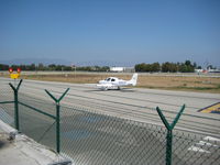 N880P @ KVNY - Taxiing to RWY 16R - by Chris Allegro