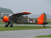 PH-DHC @ EHLE - De Havilland Canada DHC-2 Beaver MK.1 PH-DHC arriving in a shower - by Alex Smit