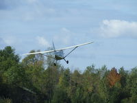 N6875M - Low pass at his home field. - by Terry L. Swann