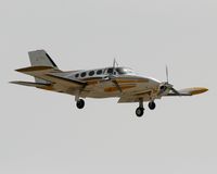 N712JW @ KAPA - Cessna 421A on final for 35L at KAPA. - by CorbieMessenger