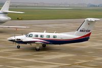 N821DK @ CID - Taxiing to Runway 13 for departure, foggy morning