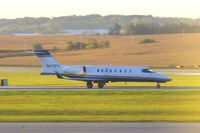 N433FX @ CID - FlexJet on takeoff roll Runway 27, not long after sunrise. - by Glenn E. Chatfield