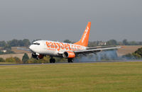 G-EZJU @ EGGW - BOEING 737-73V
