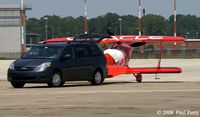 N260HP @ NKT - Being towed in by the minivan