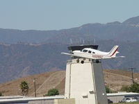 N9285C @ POC - On take-off passing Brackett Toer - by Helicopterfriend