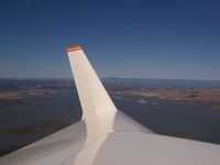 N1344T - View of left wing and Benicia, CA/Mothball fleet - by Brian Preston