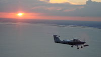 N6240A - Sunset, Okeechobee Lake - by Leo