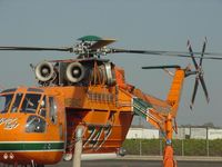 N189AC @ POC - Checking for oil leaks while turning up at Brackett - by Helicopterfriend