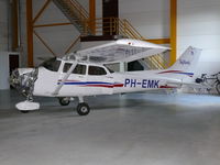 PH-EMK @ EHBK - Cessna C172R Skyhawk PH-EMK Air Service Limburg waiting for some new parts - by Alex Smit