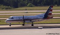 N203CJ @ IAD - One of the feeder props taxiing in.