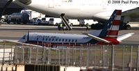 N210CJ @ IAD - Making her way past the international heavies - by Paul Perry