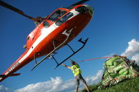 N775MA @ MOZAMBIQUE - Mercy Air's Squirrel transporting relief goods in remote Mozambique - by Matthias Reuter
