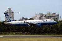 N412UA @ TJSJ - / - by Nick Dean
