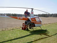 SE-JGC @ FROLUNDA K - ROBINSON R22 BETA - by Maurice Lewis Fishman