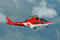 HB-XWH @ AXALP - The arrival of the Rega A109 at the Axalp across the Brienzersee. - by Joop de Groot
