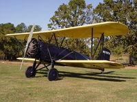 N787H @ GA2 - Stearman at Peachstate Aerodrome.  Note old fire truck in background is right at home with this old timer. - by J. Michael Travis