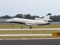 N699BG @ ORL - Falcon 900