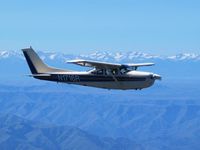 N1716R - Flying over the Cascades - by Keith Dorken