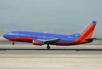 N693SW @ KLAS - / - by Nick Dean