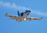 N390ZA @ KAPA - Flying South over the APA Tower. I do not know why the air breaks were down. - by Bluedharma