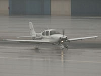 N453AT @ SMO - N453AT arriving on RWY 03 during a heavy downpour - by Torsten Hoff