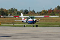 C-GGBN @ CYKF - Going though checklist before Taxi - by Shawn Hathaway