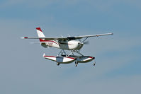 C-GOST @ CYKF - Landing Runway 08 (Canon XT, 70-300mm IS) - by Shawn Hathaway