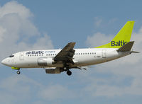 YL-BBP @ LEBL - On short final to RWY 25R. - by Jorge Molina