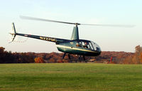 N227GC @ IA27 - The first helicopter to participate in the annual Pumpkin Drop at Antique Airfield near Blakesburg, IA - by BTBFlyboy