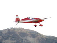 N319PH @ SZP - 1991 EXTRA Flugzeugbau Gmbh EA-300 AKROBAT, Lycoming AEIO-540-L1B5 300 Hp, takeoff climb Rwy 22-don't know why sky washed out? - by Doug Robertson