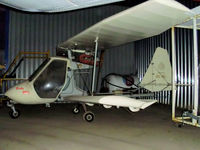 YL-MIG @ EGNR - buried in a corner of the hangar at Hawarden - by chris hall