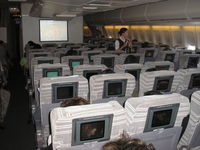JA8074 - Economy class JAL B747 - by Henk Geerlings
