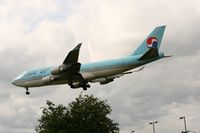 HL7404 @ EGLL - Taken at London Heathrow 11th June 2008 - by Steve Staunton