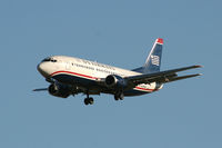N154AW @ DFW - Landing runway 36L at DFW - by Zane Adams