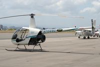N7049C @ TJIG - Waiting for his next studet at the Isla Grande Flying School Ramp.
